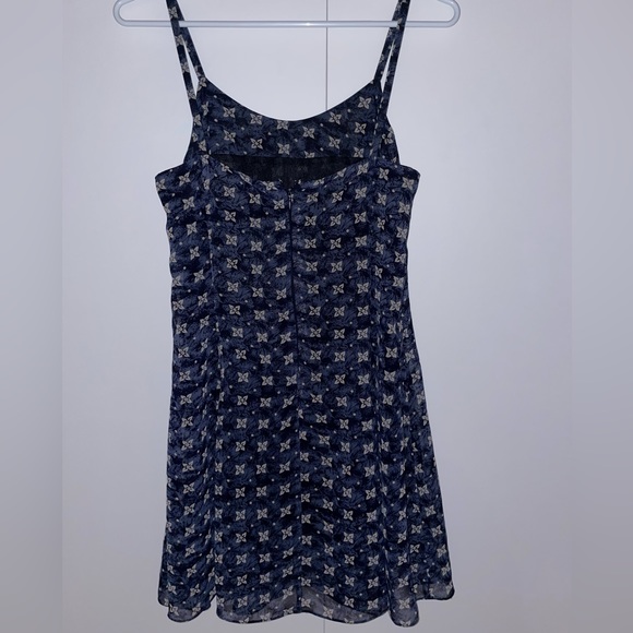 Pretty Blue flower patterned dress with thin straps. - Picture 1 of 3